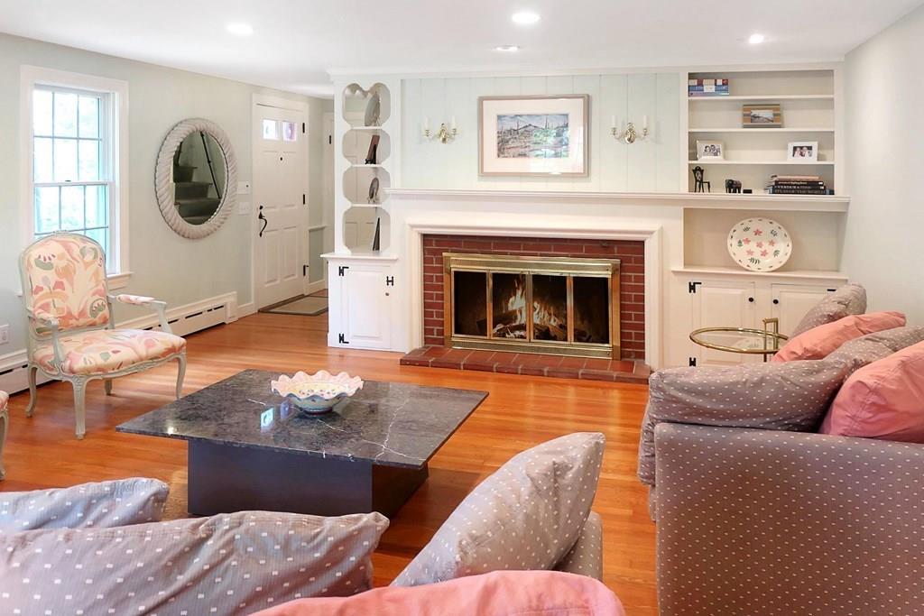 8 Henderson Road Lexington, MA 02420 - Photo 4 of 26 a living room with furniture and a fireplace