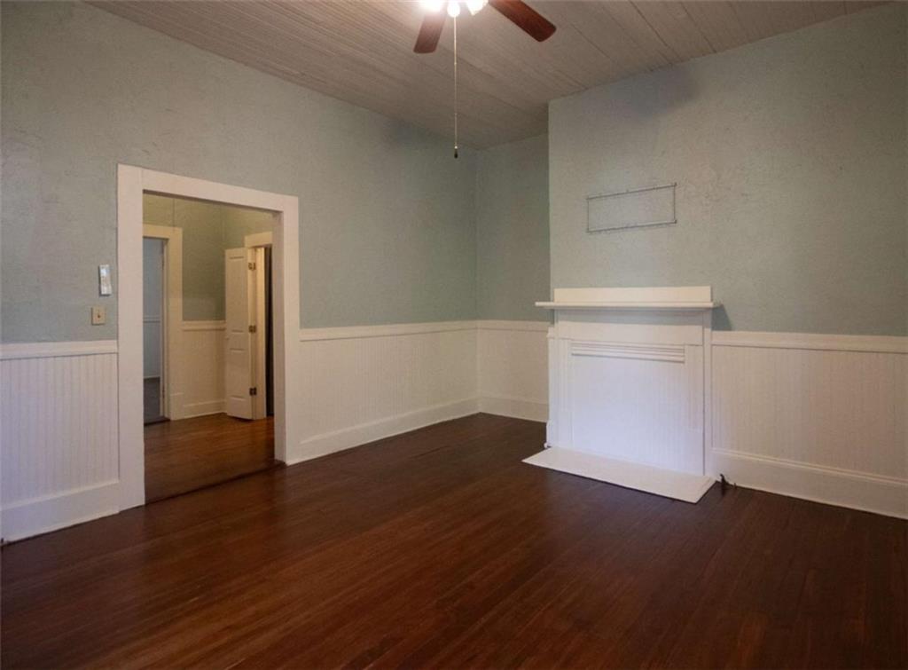 285 East Main Street Forsyth, GA 31029 - Photo 13 of 27 a view of an empty room with wooden floor