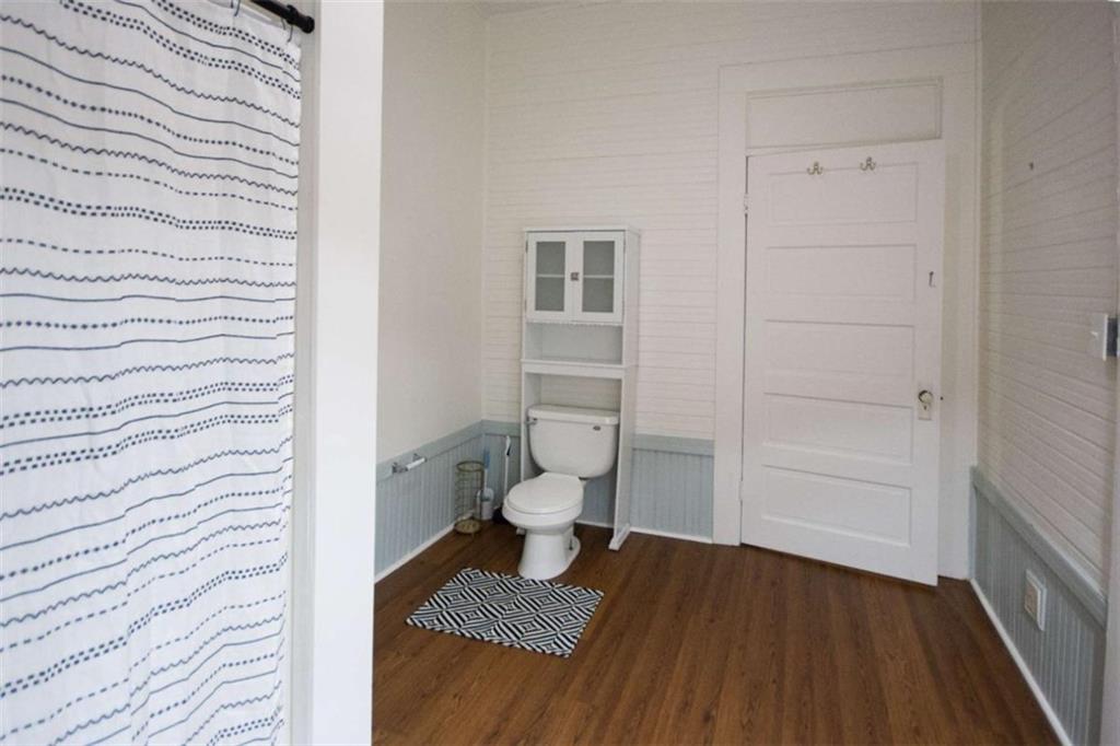 285 East Main Street Forsyth, GA 31029 - Photo 10 of 27 a bathroom with a toilet and a shower