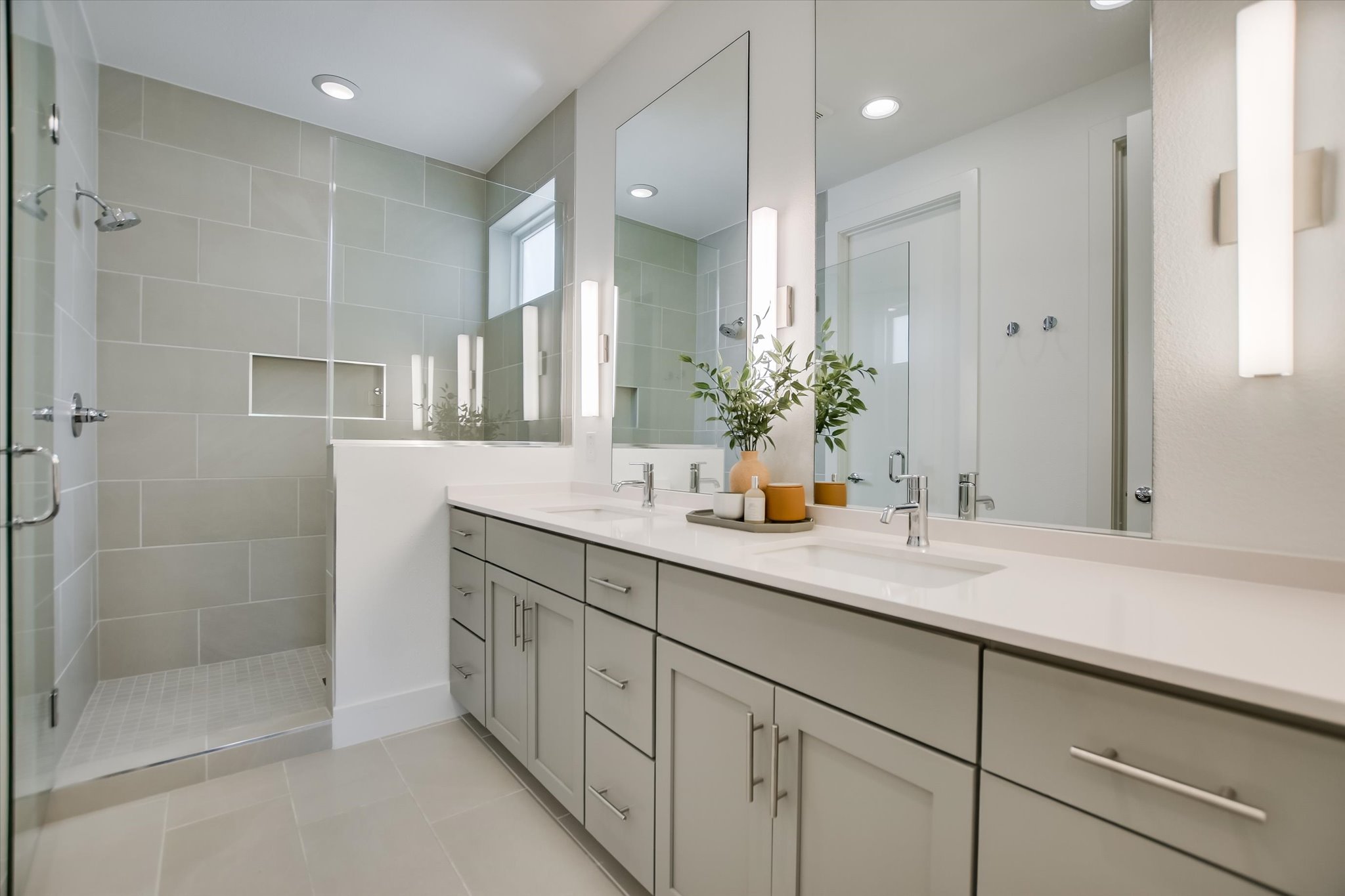 900 South 2nd Street, Unit 6 Austin, TX 78704 - Photo 16 of 25 a bathroom with a shower sink and mirror