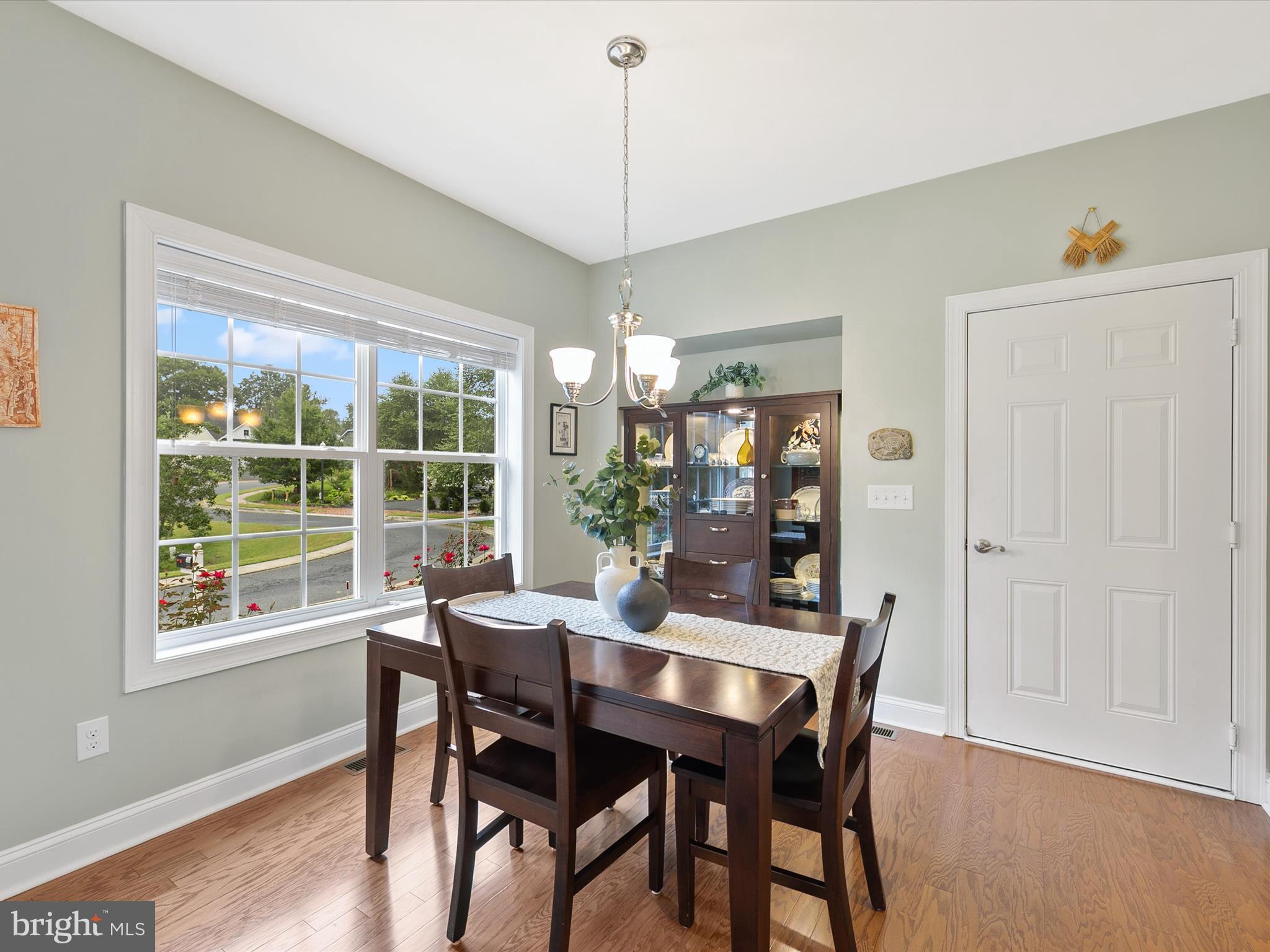 303 Valley Road Milton, DE 19968 - Photo 13 of 72 a view of a dining room with furniture window and wooden floor