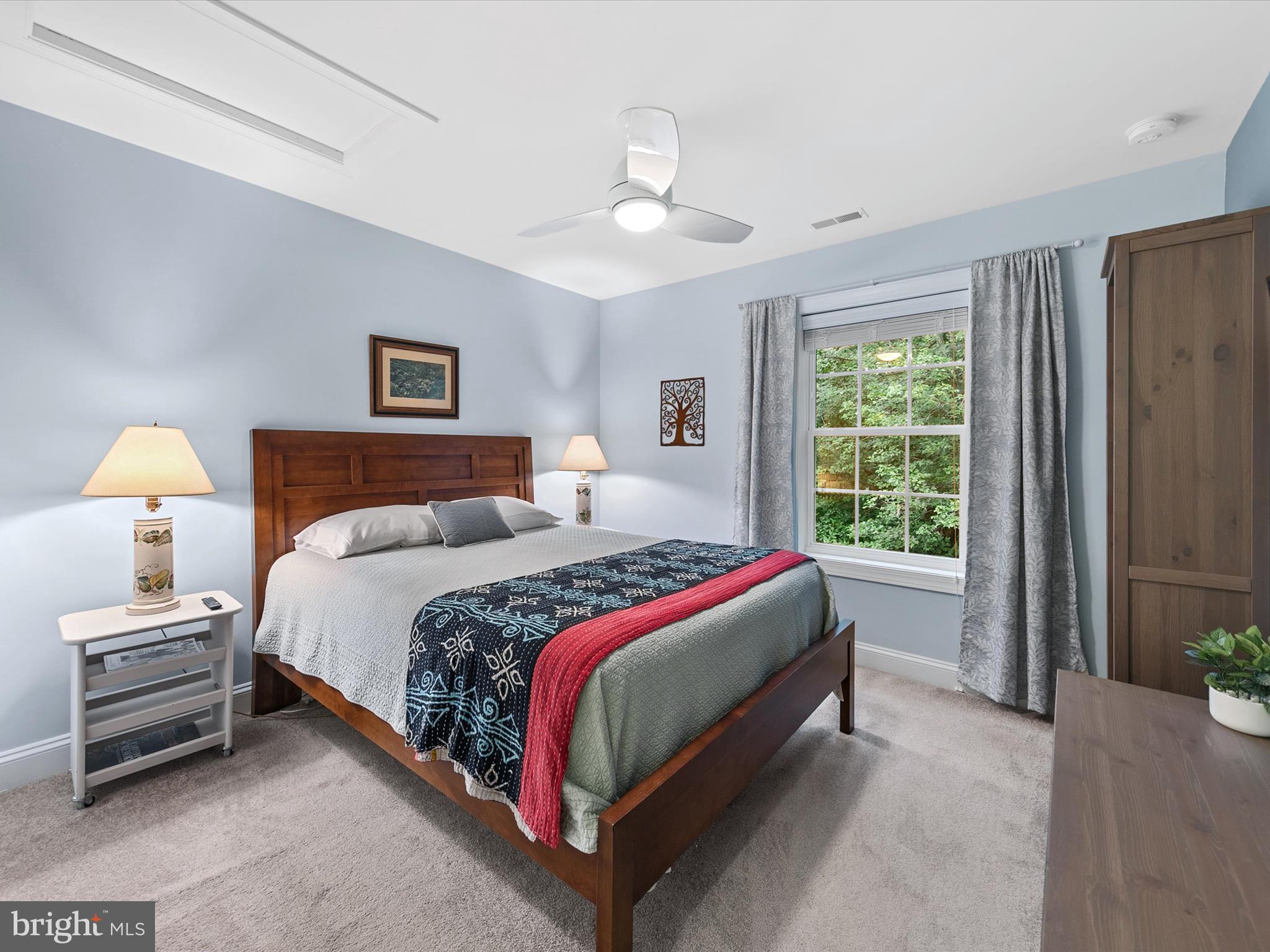 303 Valley Road Milton, DE 19968 - Photo 23 of 72 a bedroom with a bed and a window