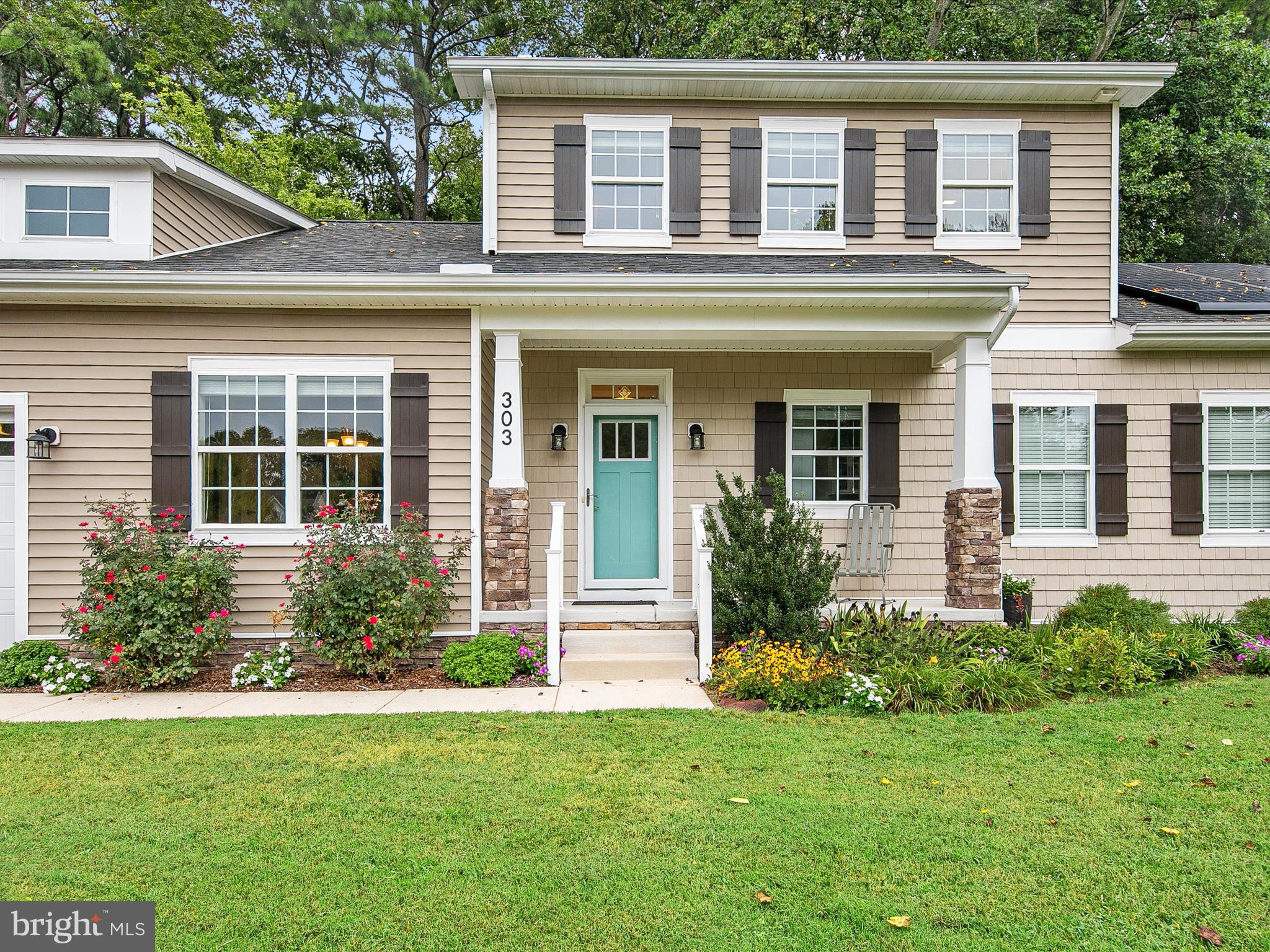 303 Valley Road Milton, DE 19968 - Photo 36 of 72 front view of a house with a yard