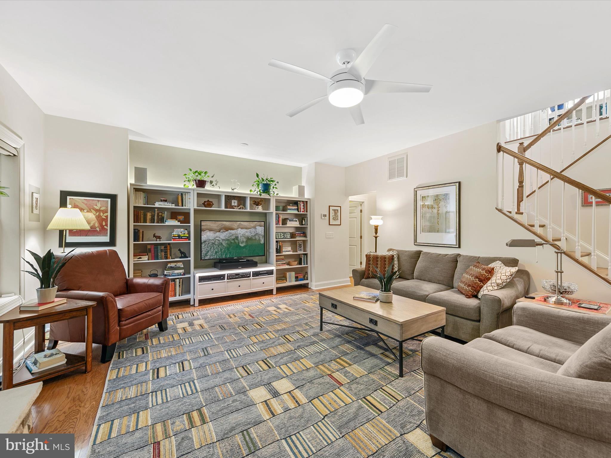 303 Valley Road Milton, DE 19968 - Photo 4 of 72 a living room with furniture and a floor to ceiling window