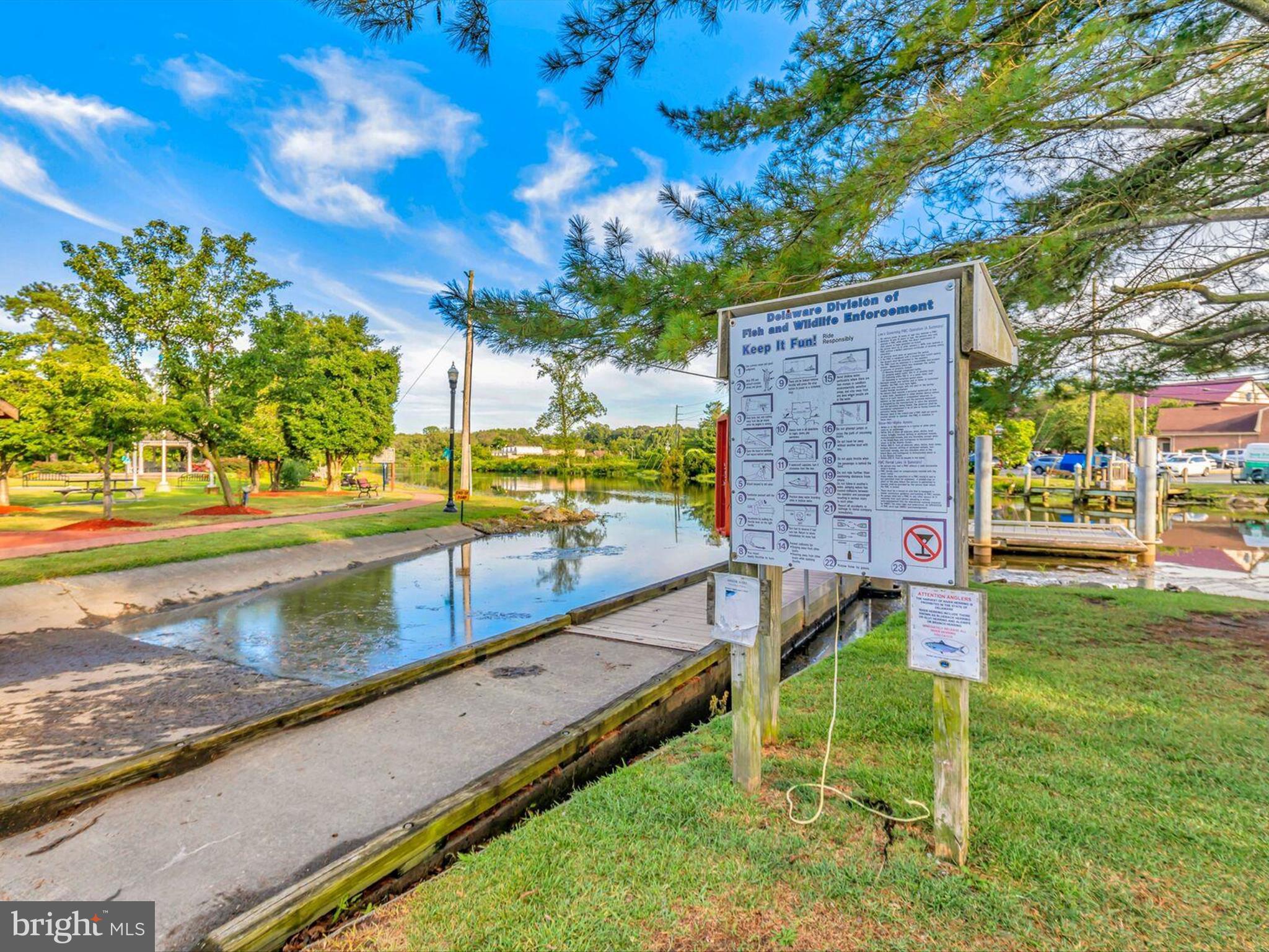 303 Valley Road Milton, DE 19968 - Photo 50 of 72 a view of a swimming pool with a patio