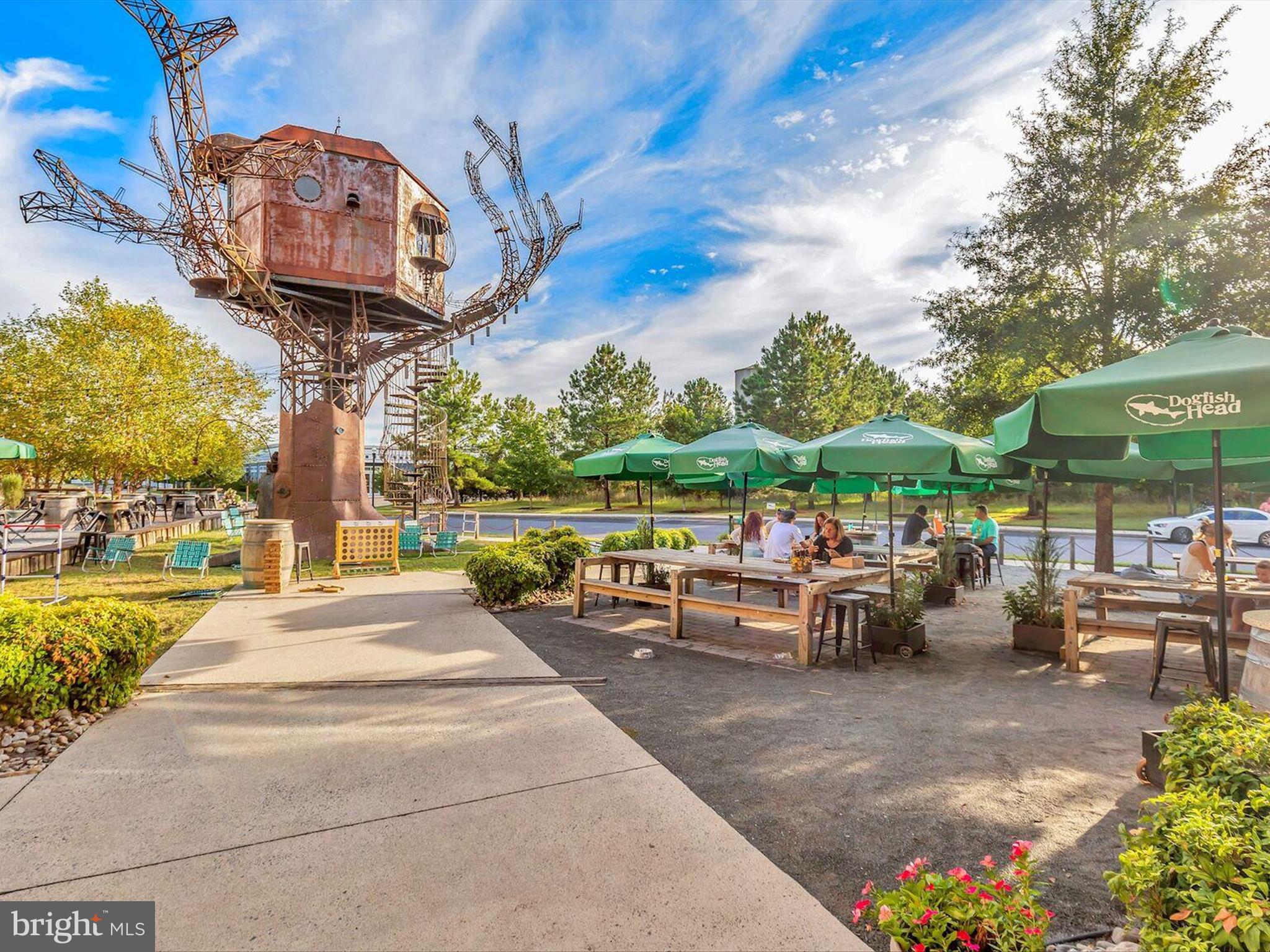 303 Valley Road Milton, DE 19968 - Photo 52 of 72 a view of a two chairs and tables in the patio
