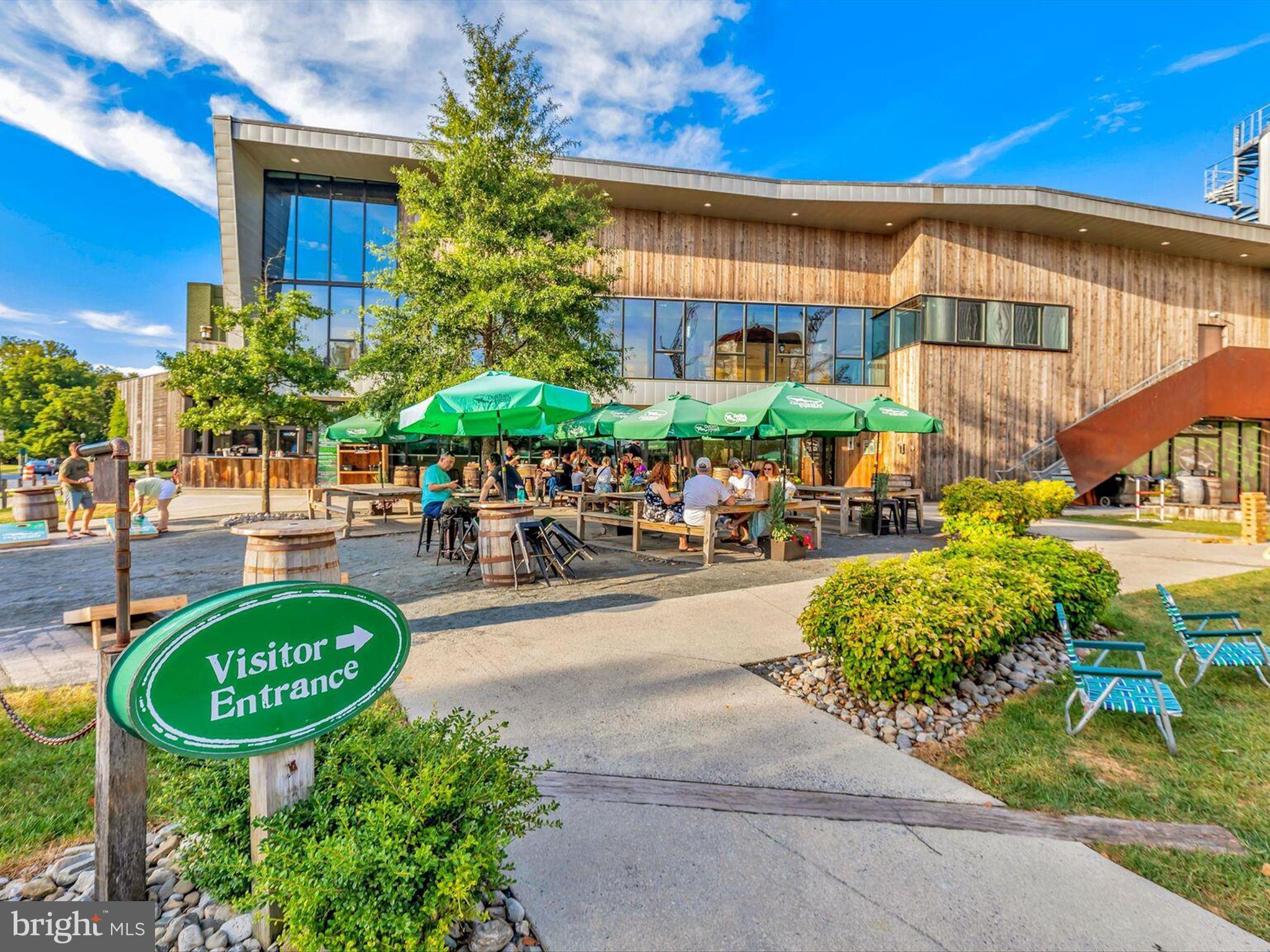 303 Valley Road Milton, DE 19968 - Photo 53 of 72 a swimming pool with outdoor seating and yard