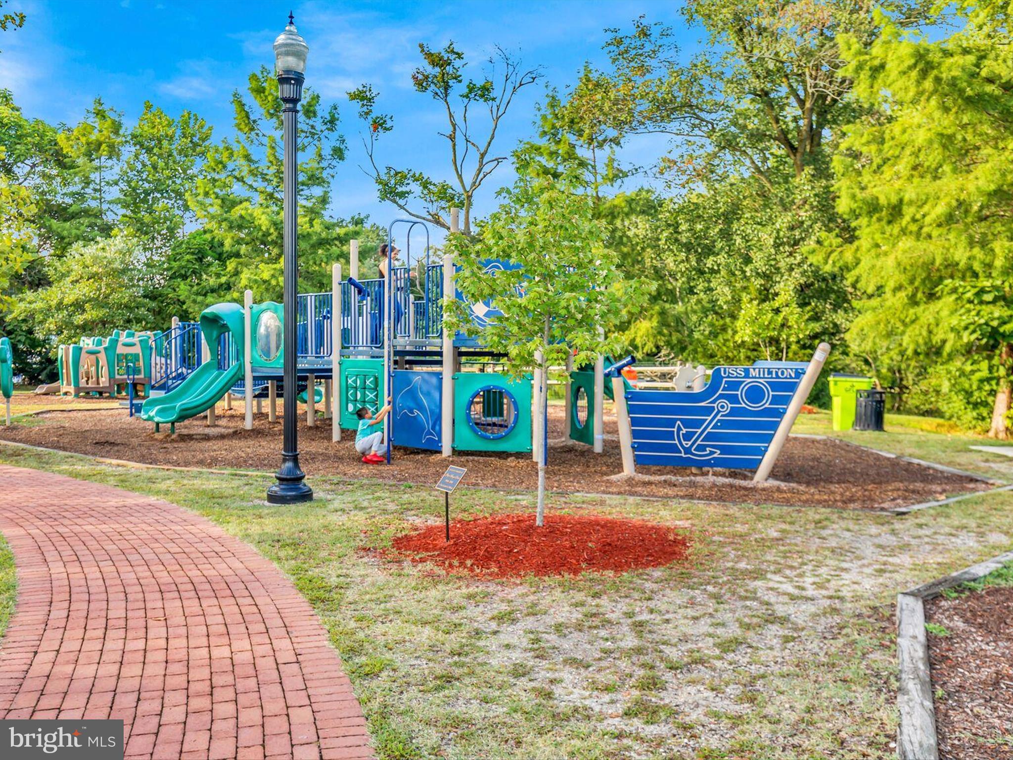 303 Valley Road Milton, DE 19968 - Photo 56 of 72 a view of a park with potted plants and large trees