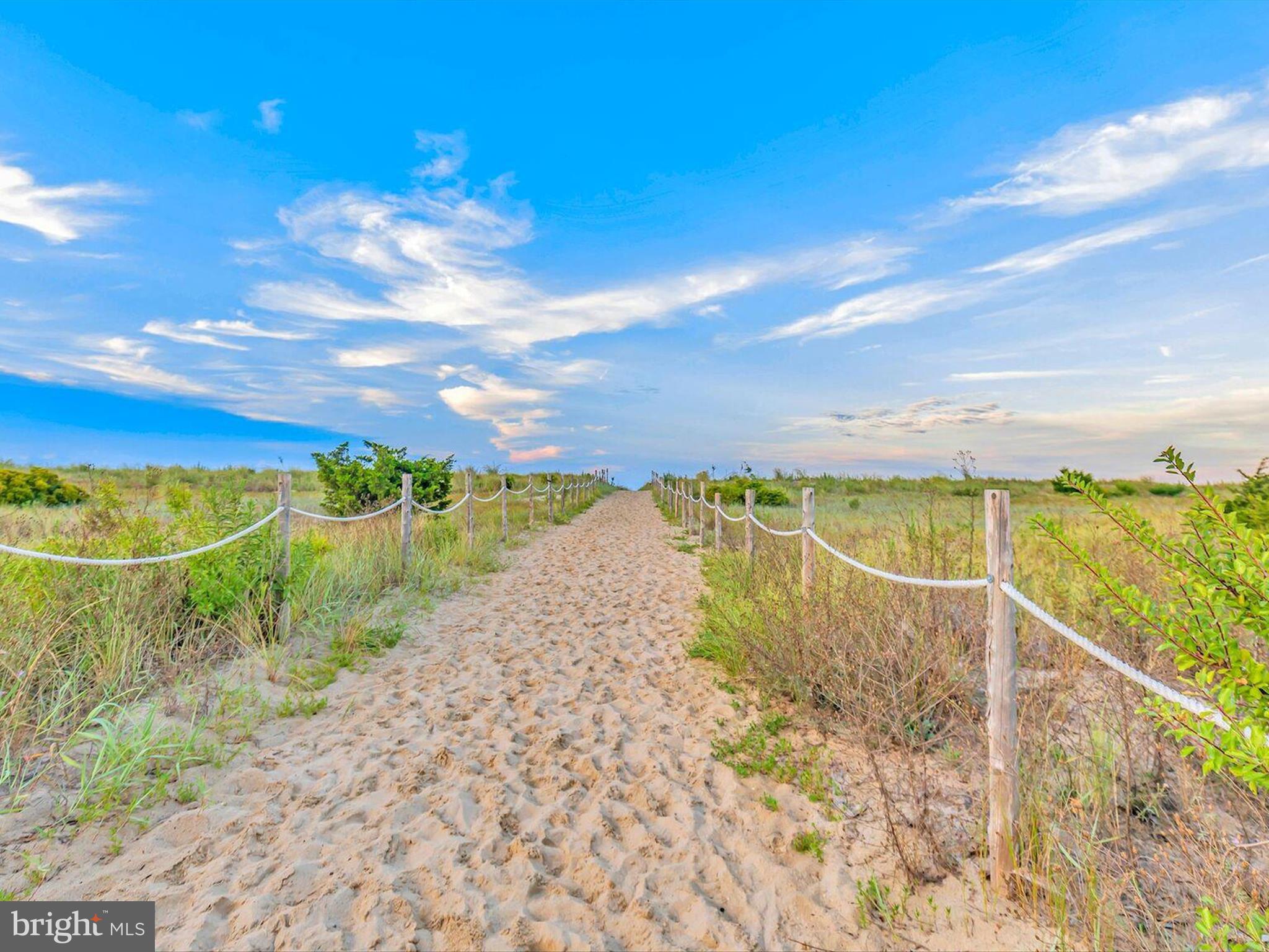 303 Valley Road Milton, DE 19968 - Photo 68 of 72 a view of a lake and a yard