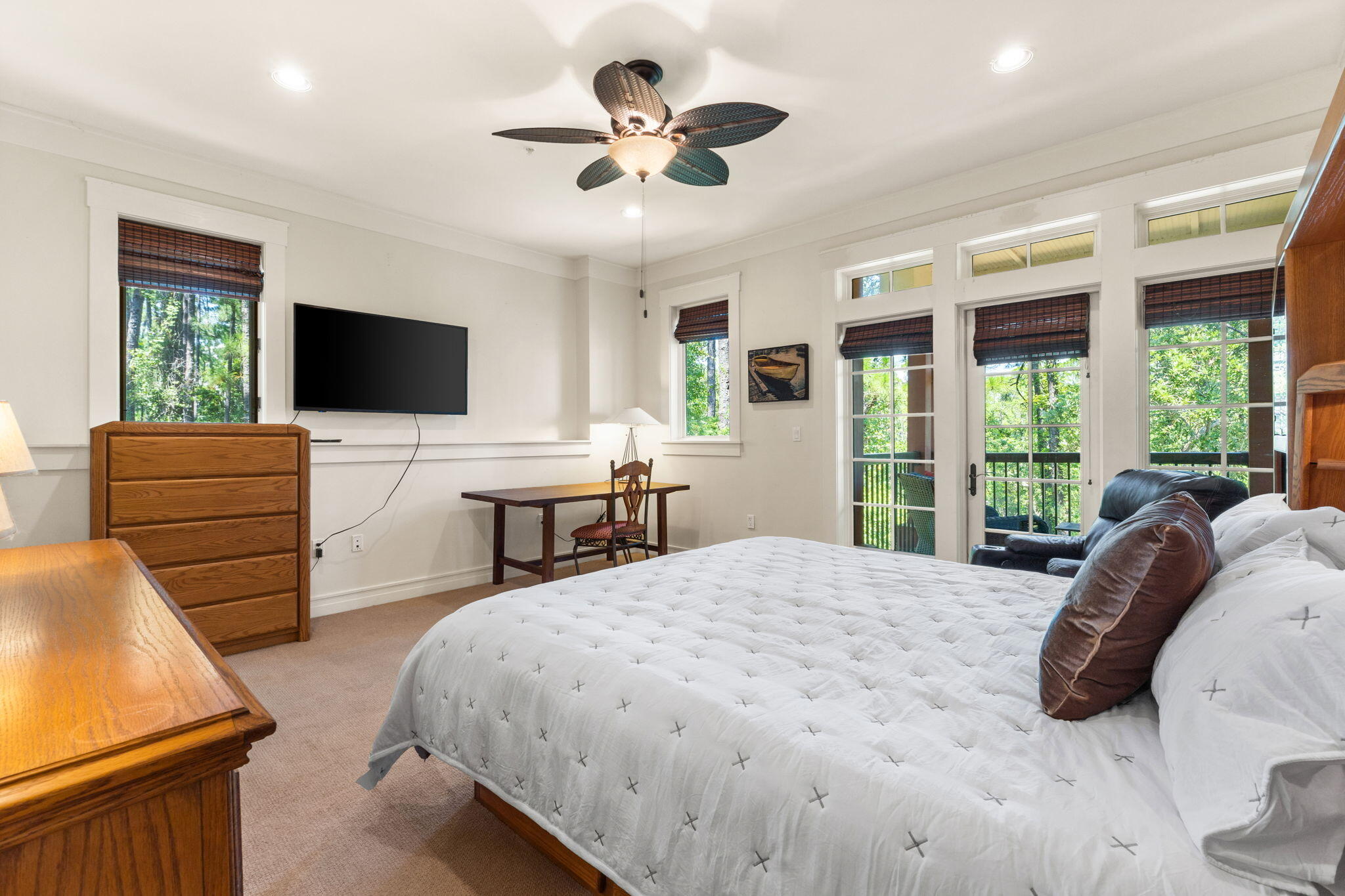 1112 Prospect Promenade, Unit 201 Panama City Beach, FL 32413 - Photo 20 of 43 a bedroom with a bed window and a flat screen television