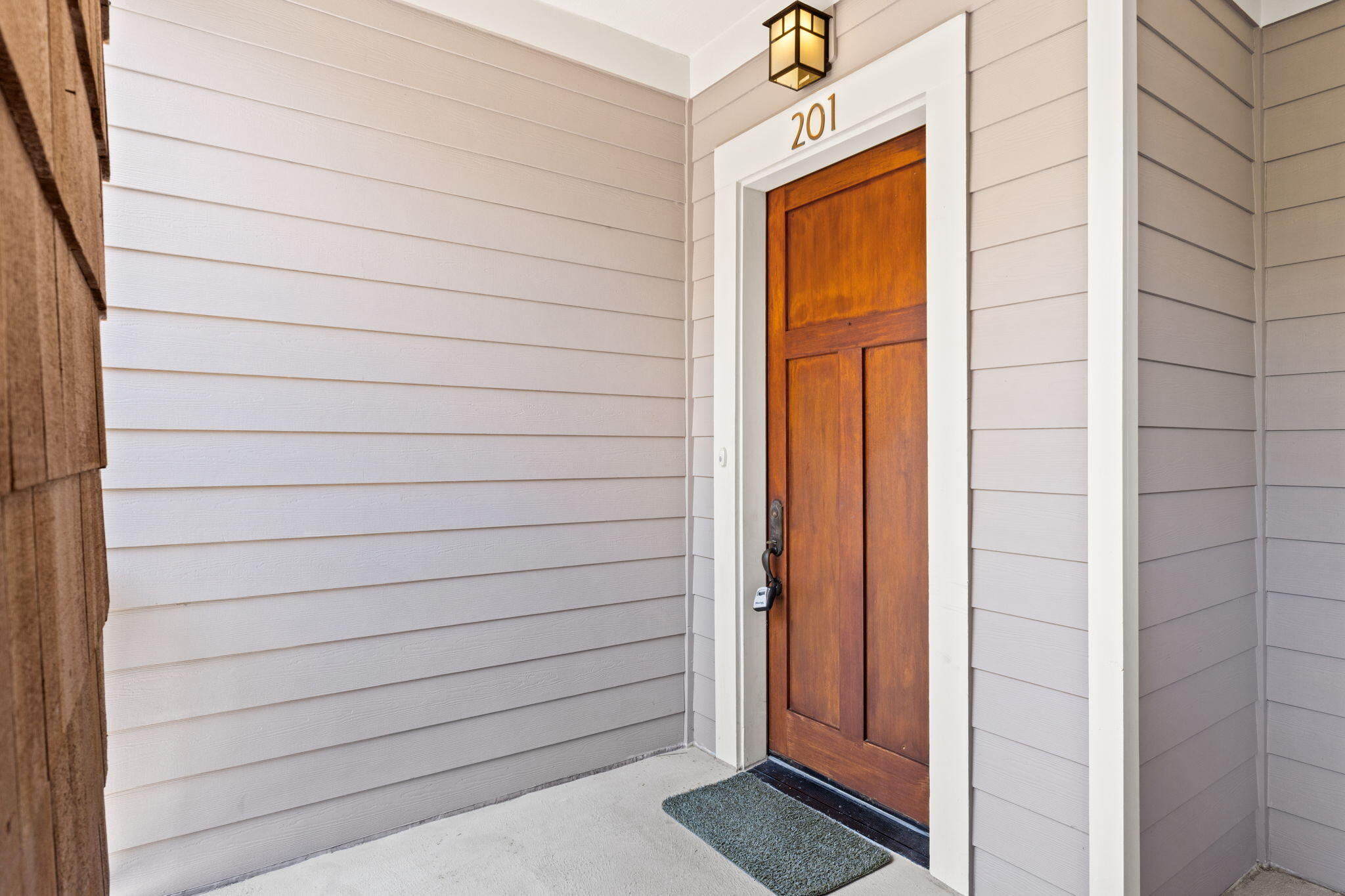 1112 Prospect Promenade, Unit 201 Panama City Beach, FL 32413 - Photo 2 of 43 a view of front door