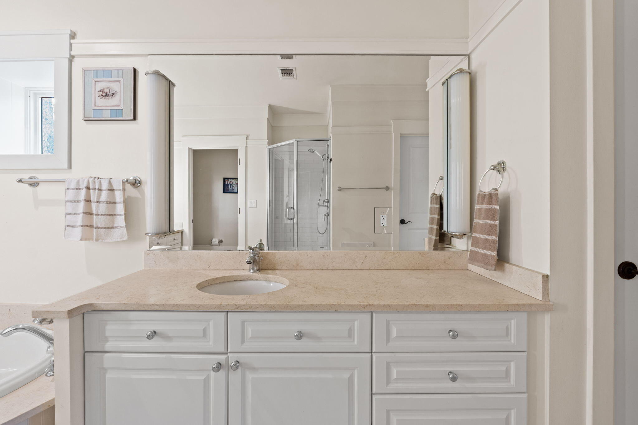 1112 Prospect Promenade, Unit 201 Panama City Beach, FL 32413 - Photo 24 of 43 a bathroom with a sink and a mirror