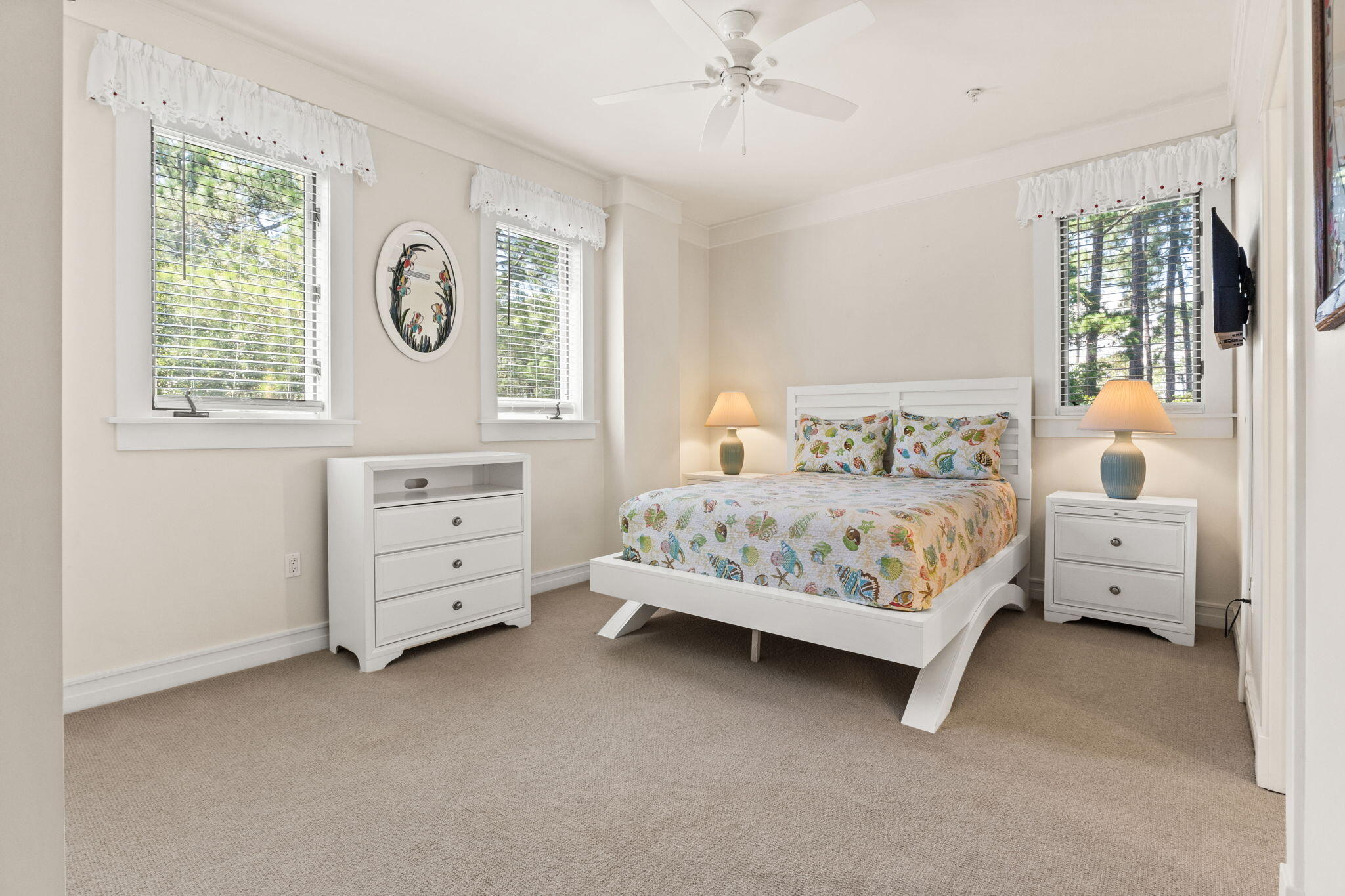 1112 Prospect Promenade, Unit 201 Panama City Beach, FL 32413 - Photo 26 of 43 a bedroom with a bed and a window