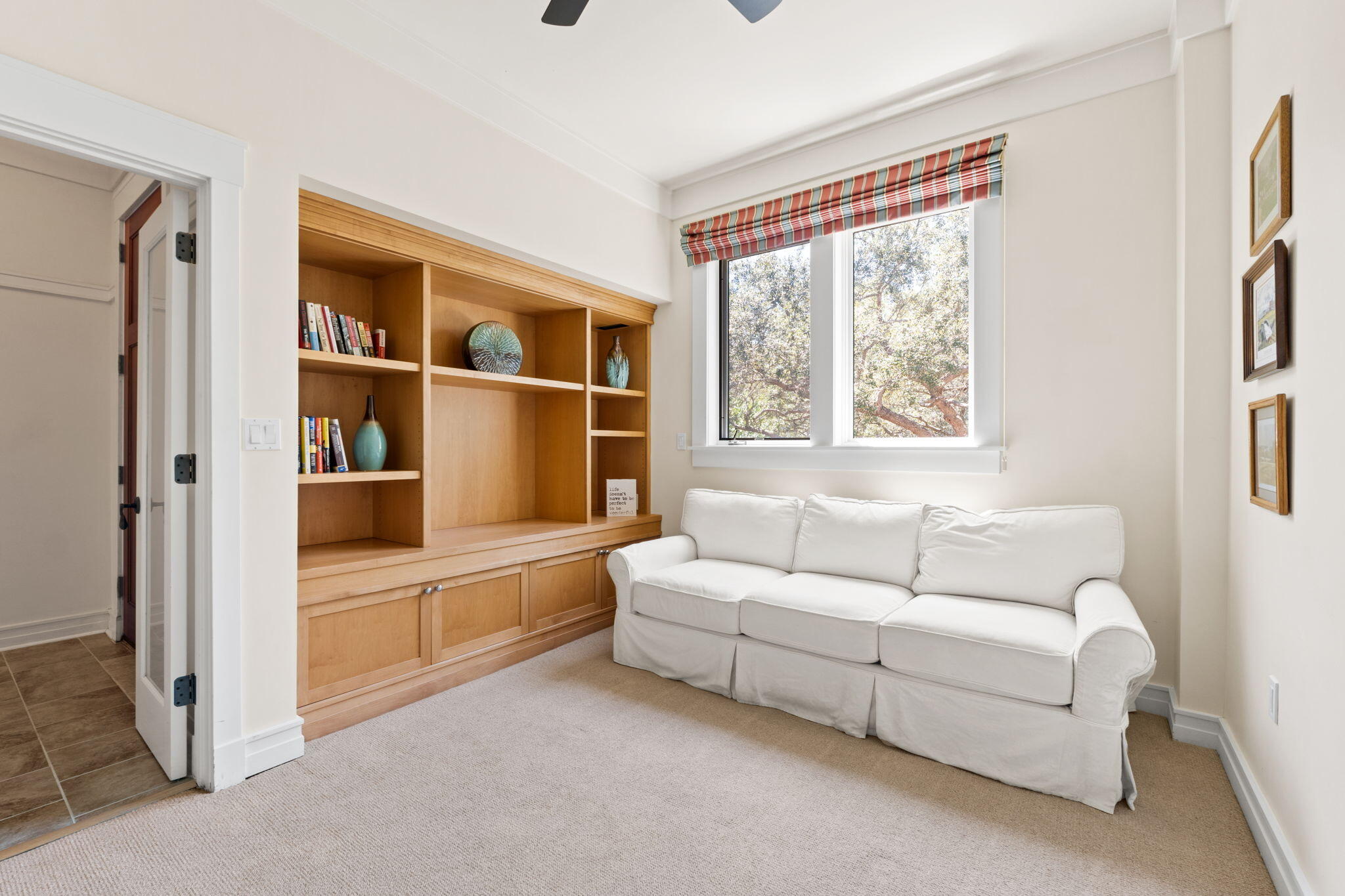 1112 Prospect Promenade, Unit 201 Panama City Beach, FL 32413 - Photo 32 of 43 a living room with furniture and a window