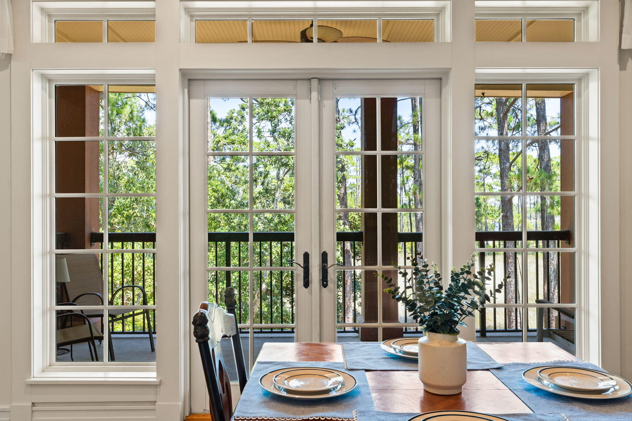 1112 Prospect Promenade, Unit 201 Panama City Beach, FL 32413 - Photo 7 of 43 a living room with furniture and a potted plant