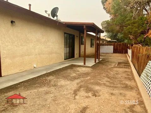 1004 West Perdew Avenue Ridgecrest, CA 93555 - Photo 10 of 14 a view of a house with a snow