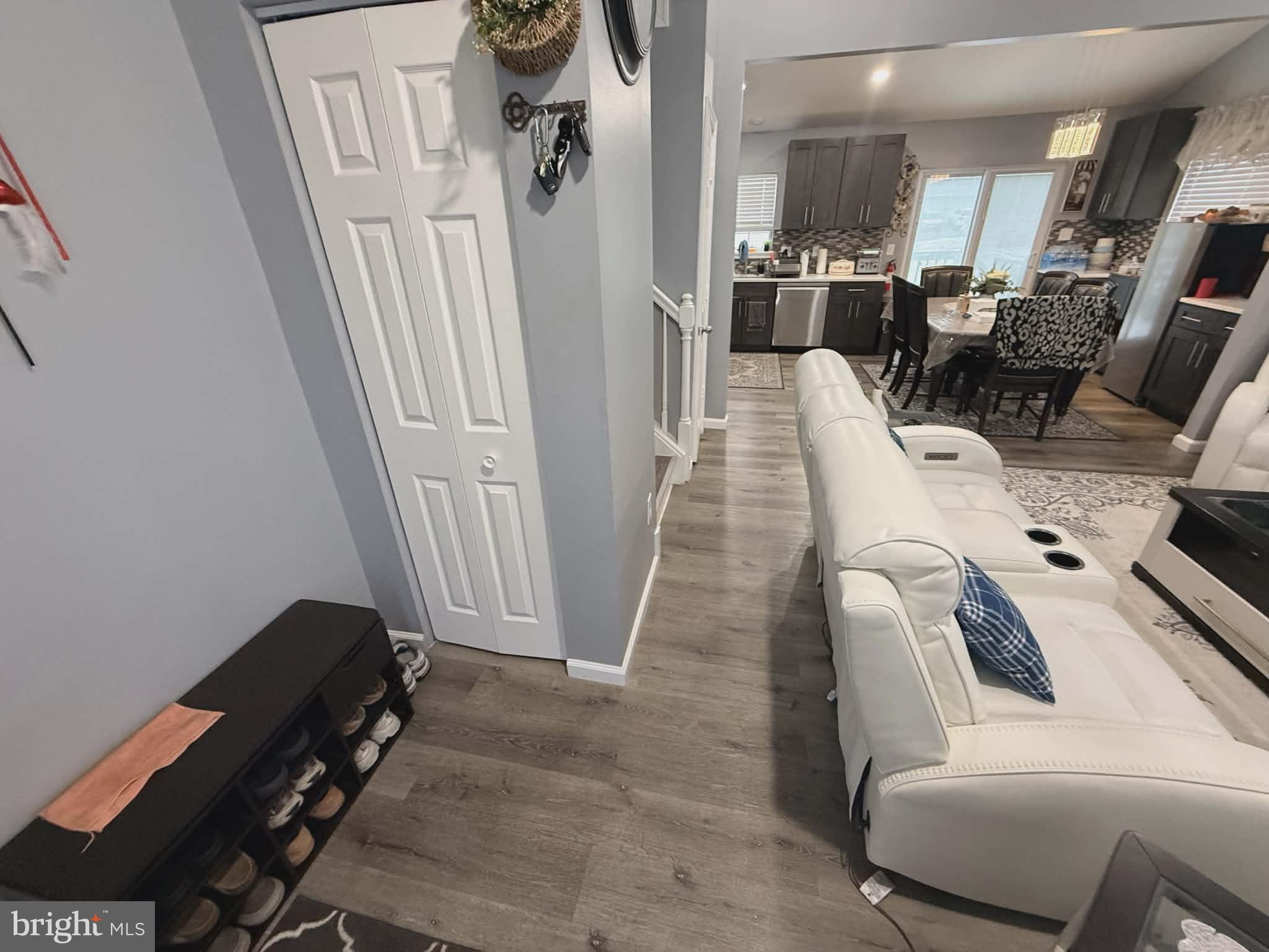 9 Brafferton Way Rosedale, MD 21237 - Photo 11 of 26 a living room with furniture and a flat screen tv