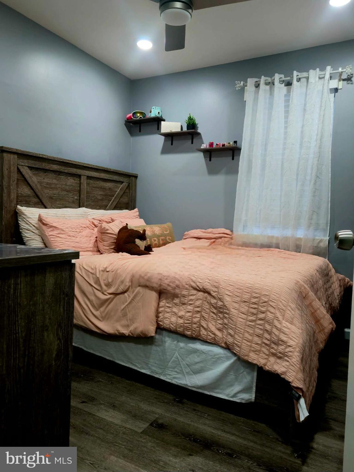 9 Brafferton Way Rosedale, MD 21237 - Photo 16 of 26 a bedroom with a bed and a dresser