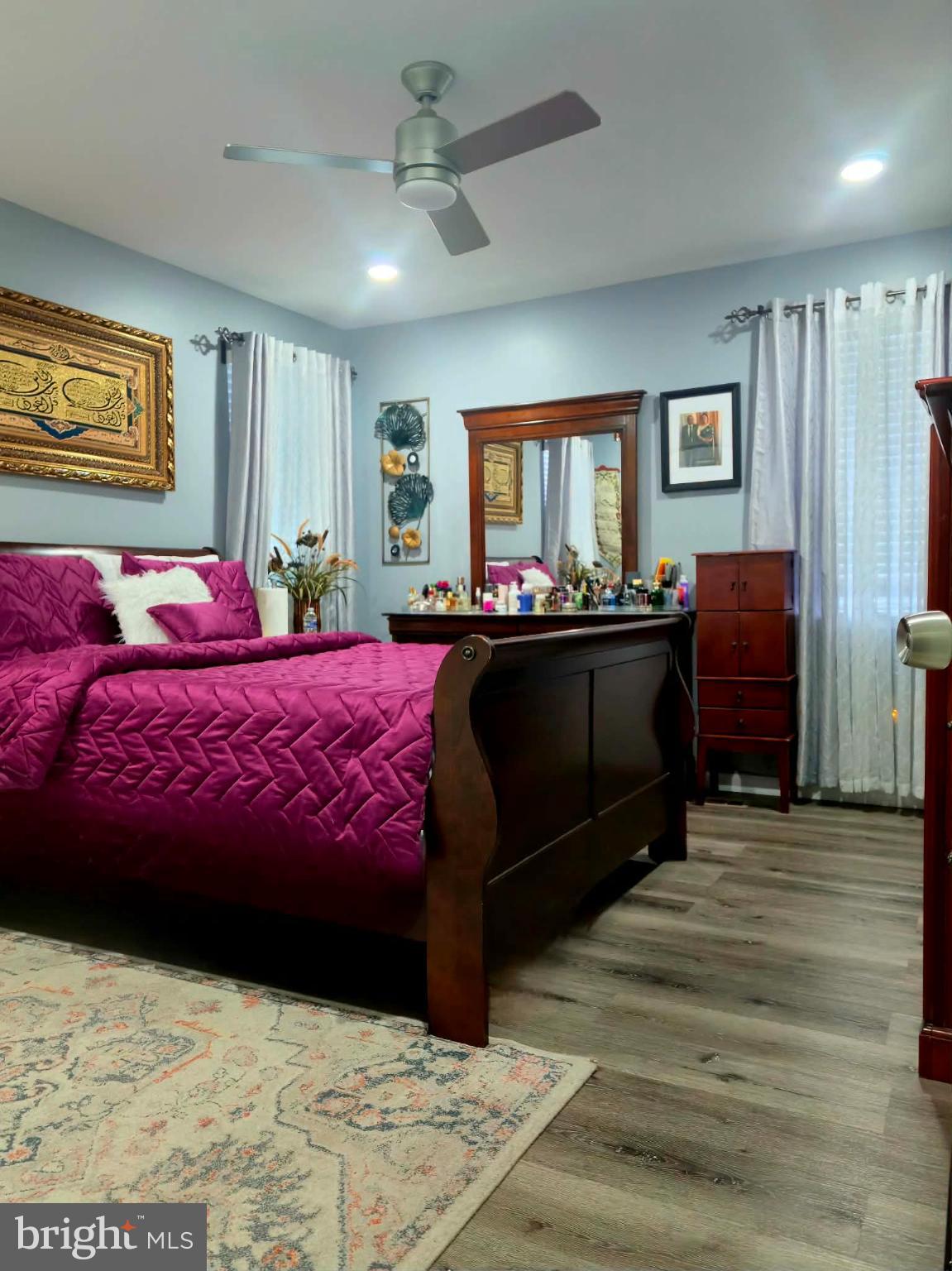 9 Brafferton Way Rosedale, MD 21237 - Photo 17 of 26 a bedroom with a bed and wooden floor