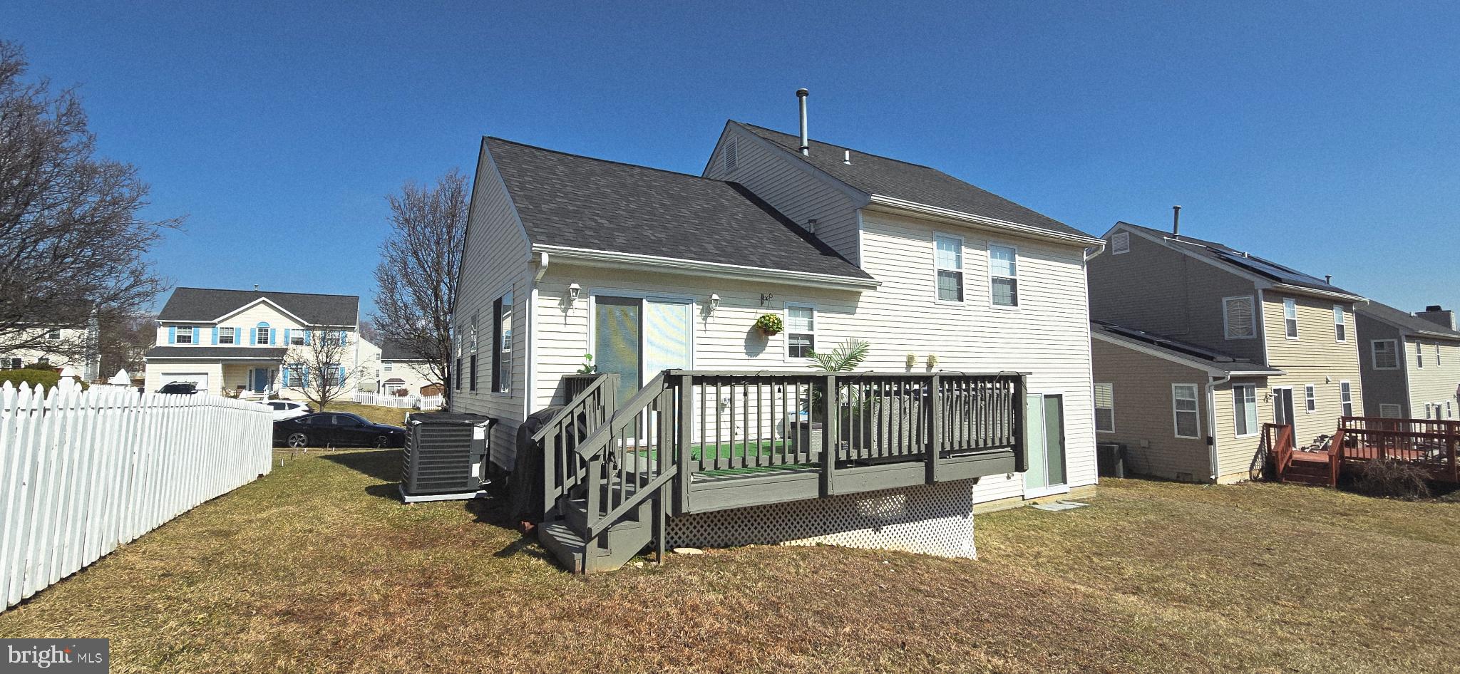 9 Brafferton Way Rosedale, MD 21237 - Photo 3 of 26 a view of a house with a wooden deck