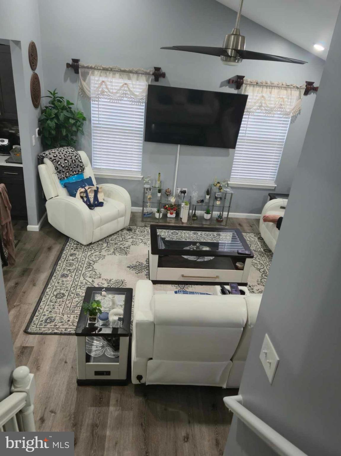 9 Brafferton Way Rosedale, MD 21237 - Photo 9 of 26 a kitchen with a stove and a flat screen tv