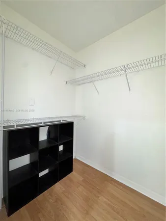 a room with a dresser
