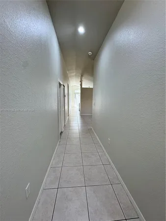 an entryway of a house with hallway