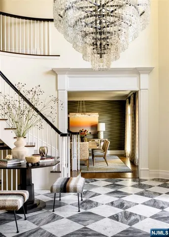 a view of hall way with furniture