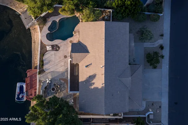 a view of a house with pool table and chairs