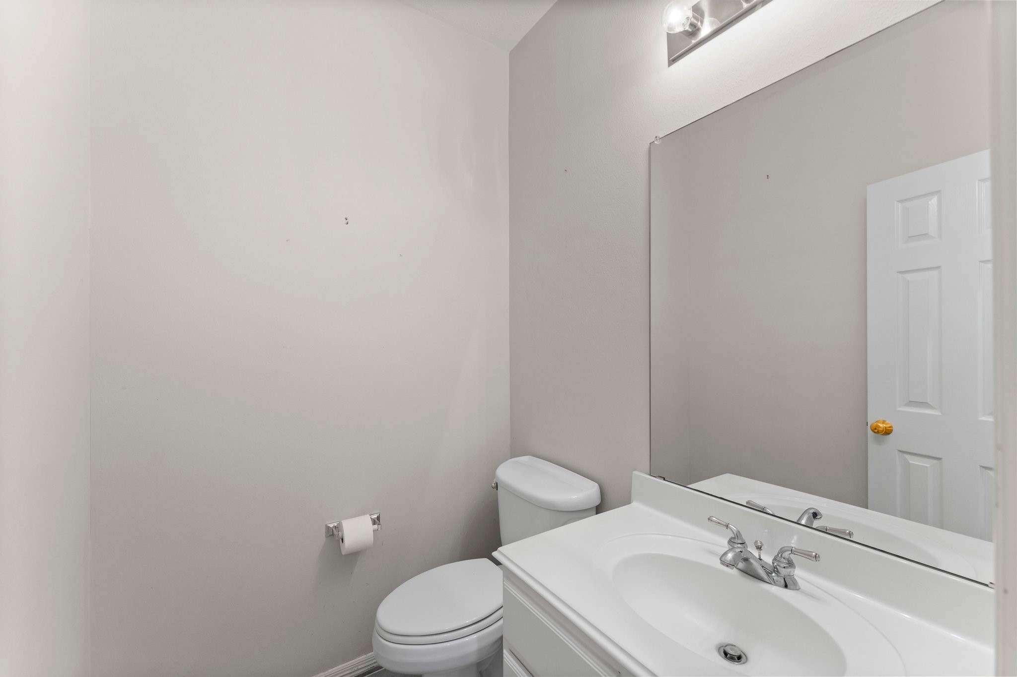 25814 Clear Springs Way Spring, TX 77373 - Photo 11 of 48 a bathroom with a sink a toilet and mirror