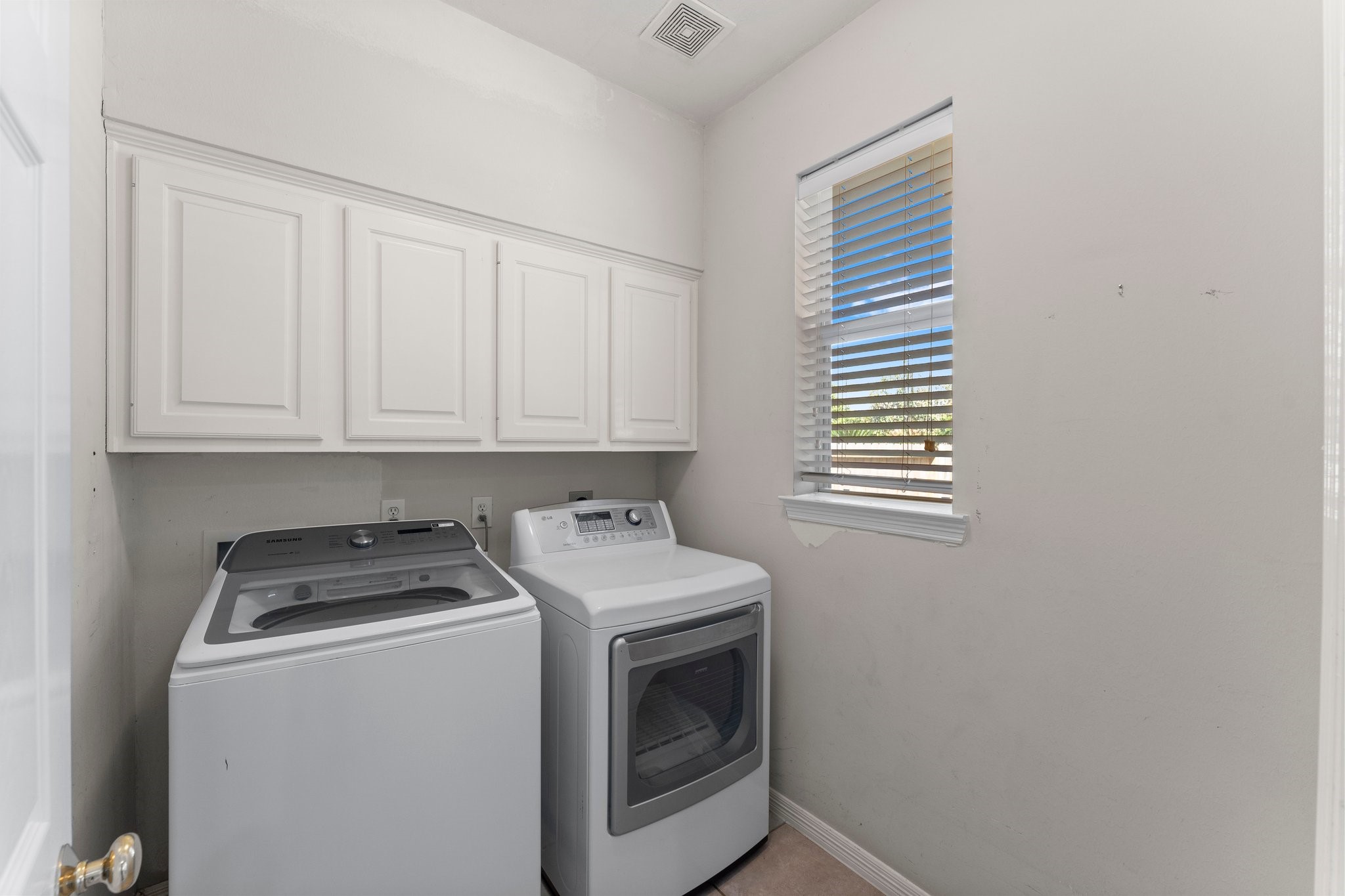 25814 Clear Springs Way Spring, TX 77373 - Photo 20 of 48 a utility room with dryer and washer