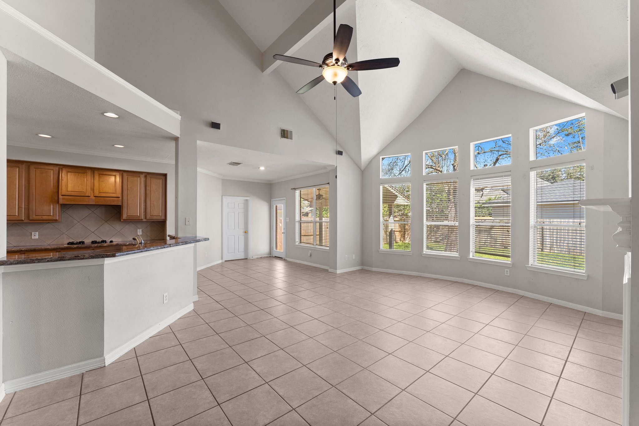 25814 Clear Springs Way Spring, TX 77373 - Photo 25 of 48 a large kitchen with stainless steel appliances granite countertop a stove and a refrigerator