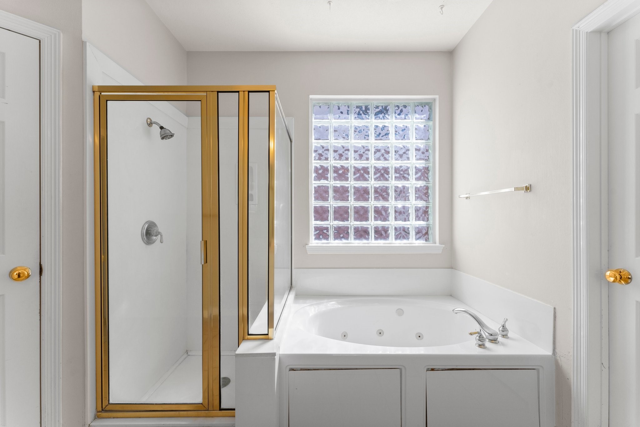 25814 Clear Springs Way Spring, TX 77373 - Photo 31 of 48 a bathroom with a sink a bath tub and a shower