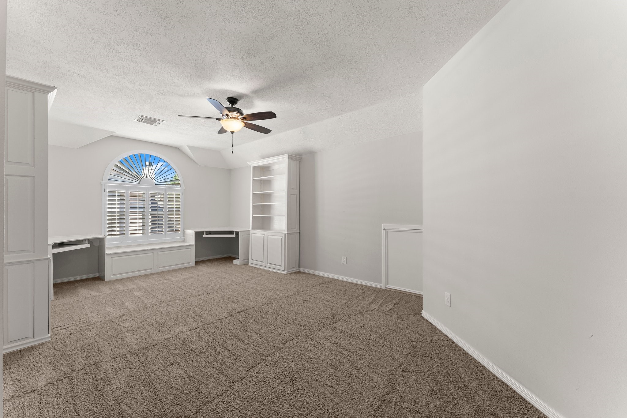 25814 Clear Springs Way Spring, TX 77373 - Photo 34 of 48 an empty room with windows and fan