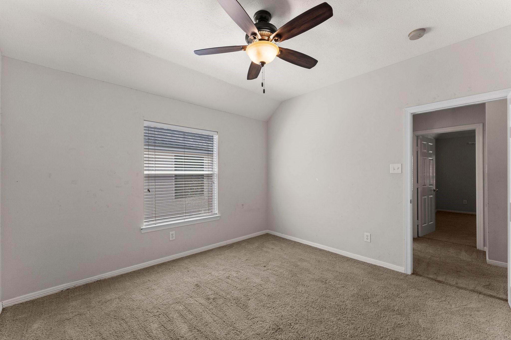 25814 Clear Springs Way Spring, TX 77373 - Photo 44 of 48 an empty room with a window and a fan