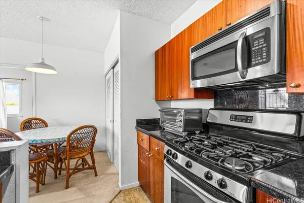 a bedroom with a bed and a ceiling fan