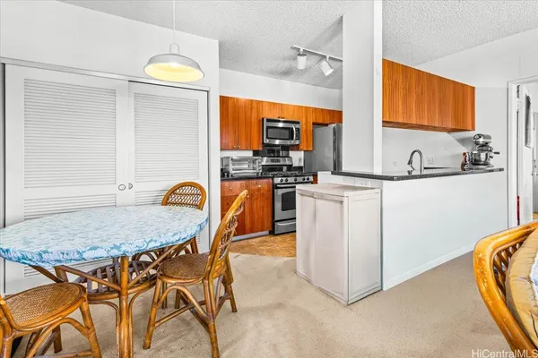 a bedroom with a bed and a table