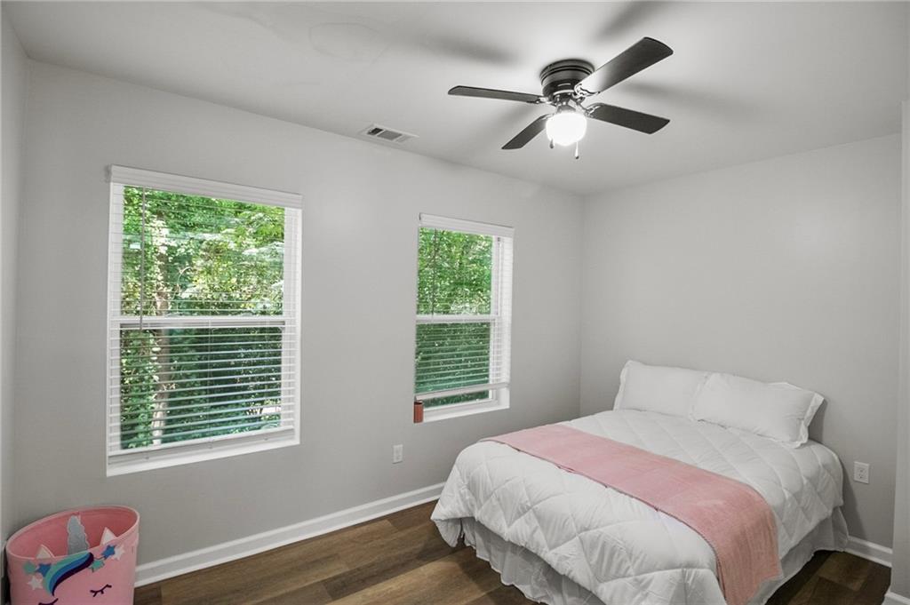 1912 Kitchens Road Macon, GA 31211 - Photo 14 of 20 a bedroom with a bed and window