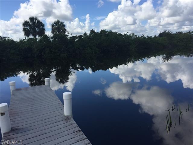 30445 Holly Road Punta Gorda, FL 33982 - Photo 4 of 15 a view of a house with a yard
