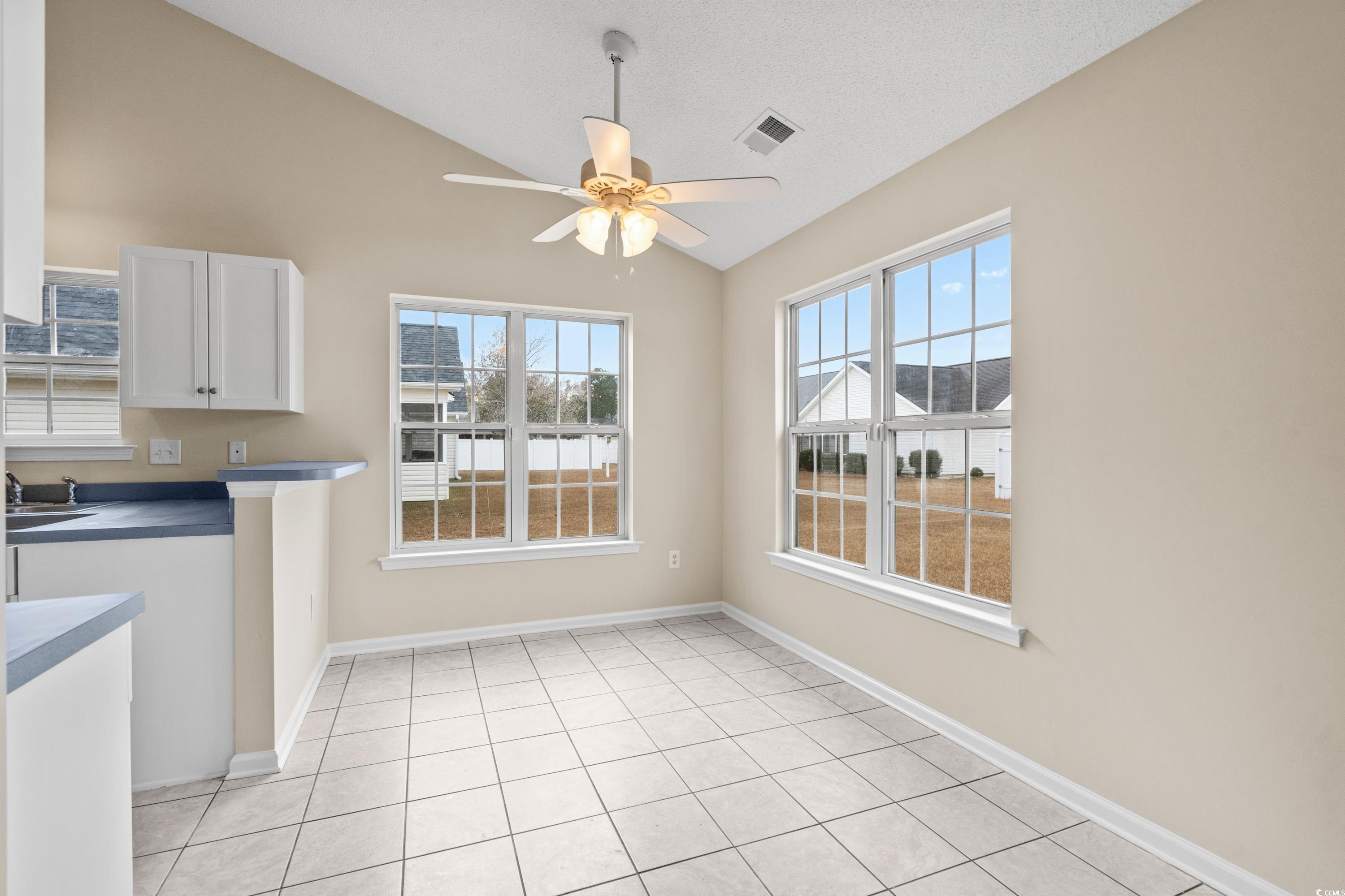 109 Governors Loop Myrtle Beach, SC 29588 - Photo 12 of 34 Unfurnished living room featuring ceiling fan, hig
