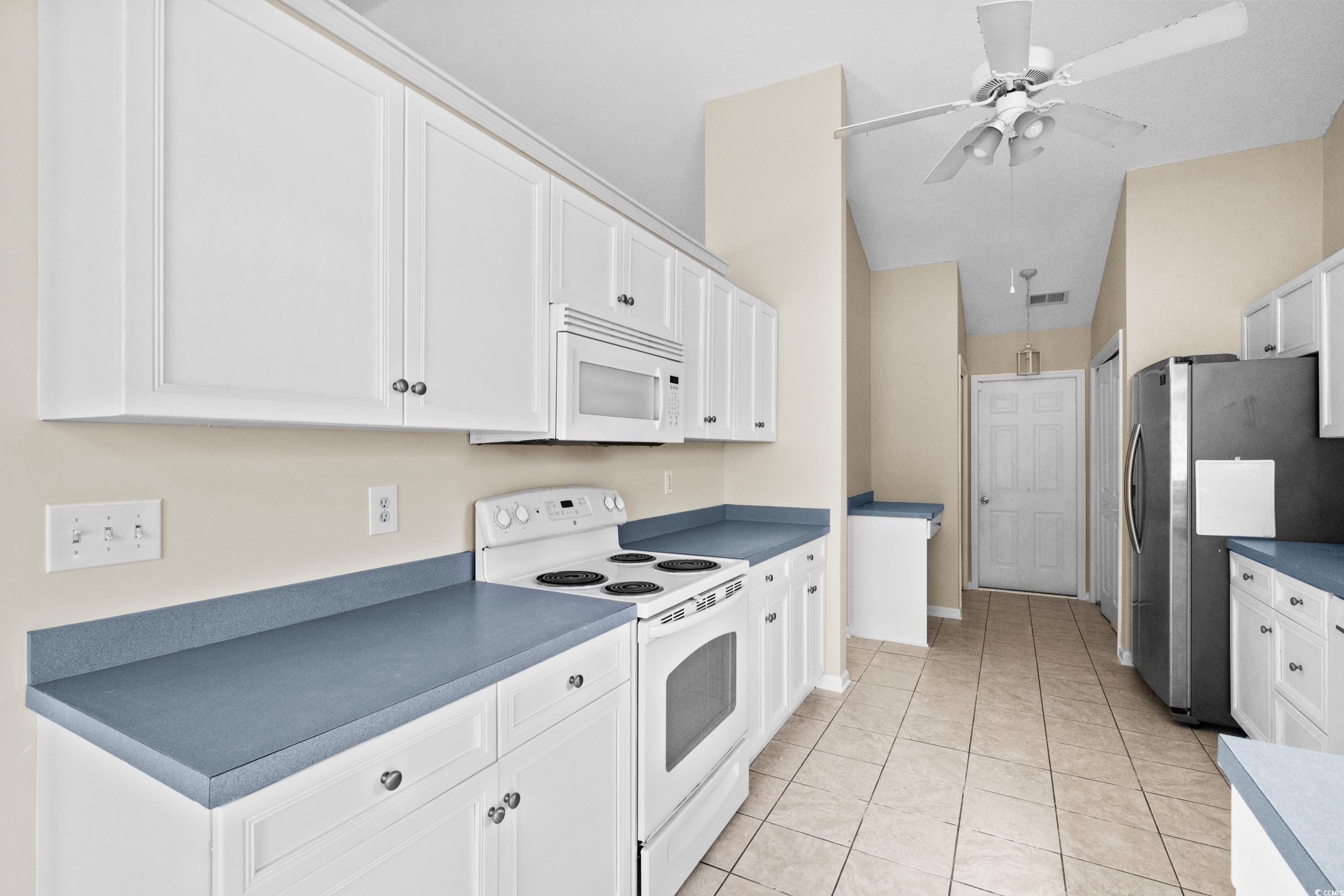 109 Governors Loop Myrtle Beach, SC 29588 - Photo 17 of 34 Kitchen featuring stainless steel refrigerator, wh