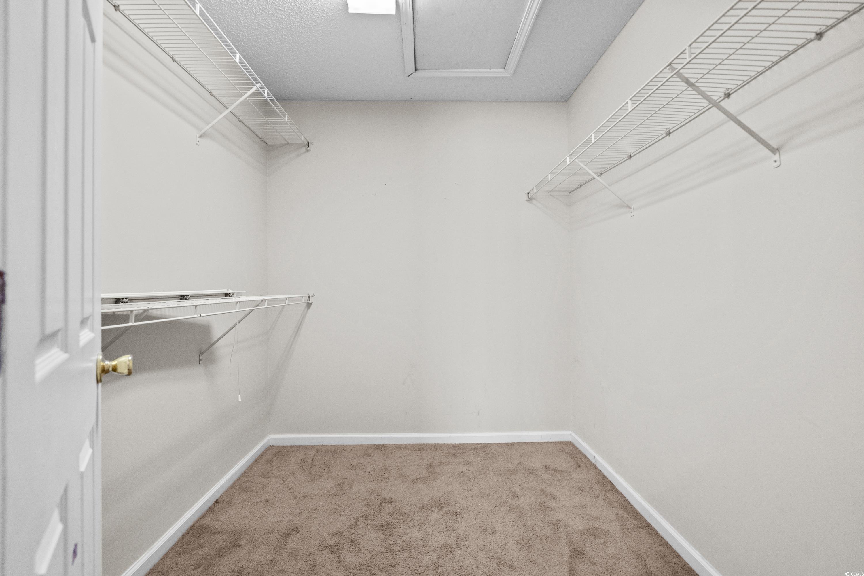109 Governors Loop Myrtle Beach, SC 29588 - Photo 26 of 34 Unfurnished bedroom with ceiling fan, vaulted ceil