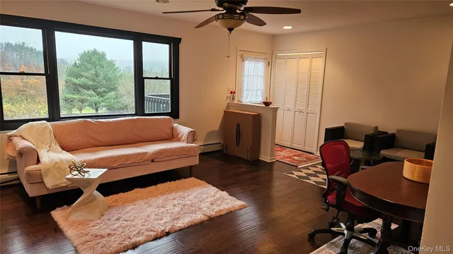 a room with furniture and a window