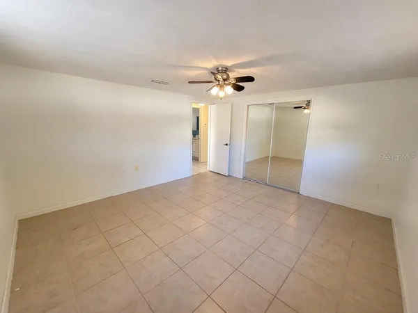 a view of a big room with carpet