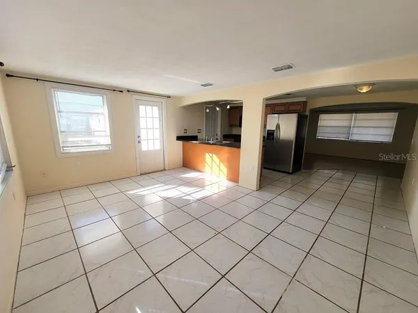 a view of an empty room and window