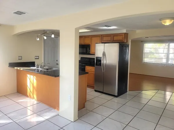 a view of a kitchen with a sink