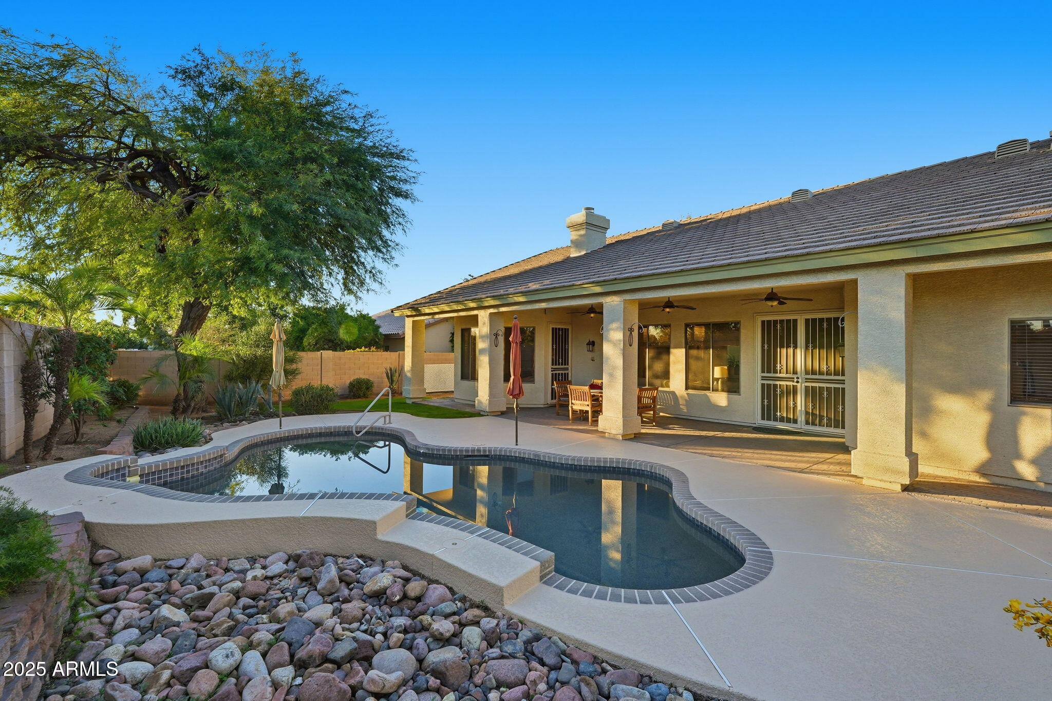 4409 East Janice Way Phoenix, AZ 85032 - Photo 34 of 41 a front view of a house with garden