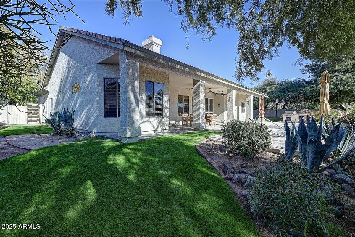 4409 East Janice Way Phoenix, AZ 85032 - Photo 36 of 41 a backyard of a house with lots of green space