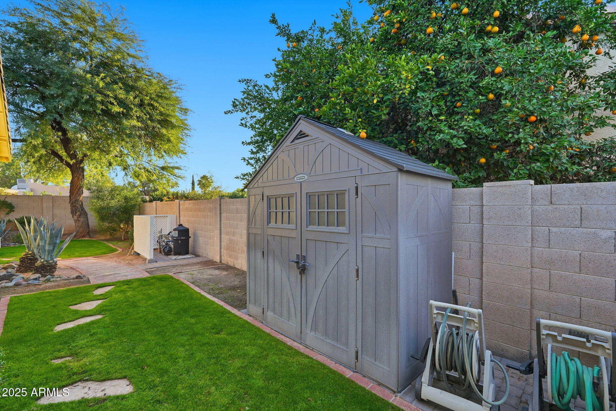 4409 East Janice Way Phoenix, AZ 85032 - Photo 40 of 41 a front view of a house with garden