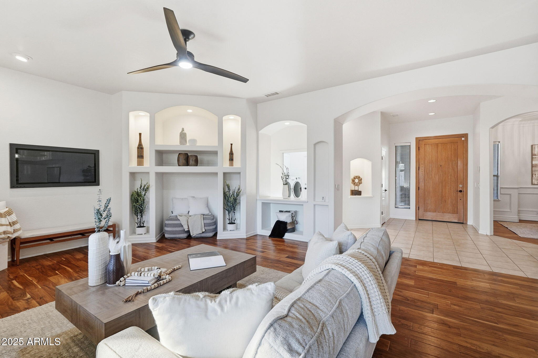 4409 East Janice Way Phoenix, AZ 85032 - Photo 5 of 41 a living room with furniture a flat screen tv and kitchen view